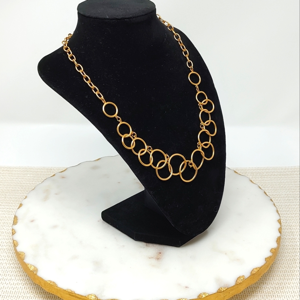 Premier Designs matte gold tone necklace with intersecting circle loops